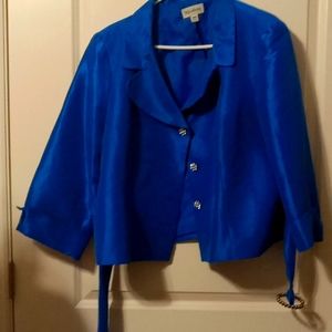 Women two piece peacock blue skirt suit.